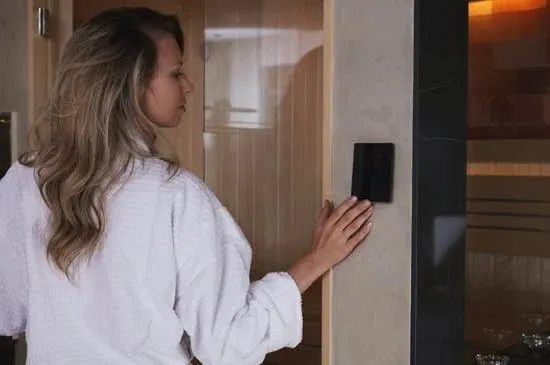 Couples Enjoying Sauna Together Couple relaxing together in spacious two-person sauna