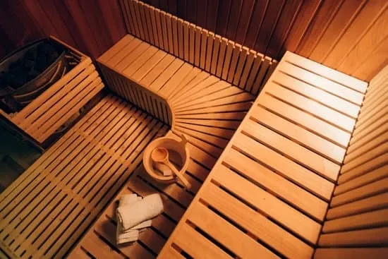 Space-Efficient Sauna Placement Portable sauna setup in corner of small apartment